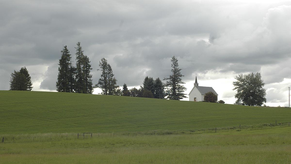 clouds over church