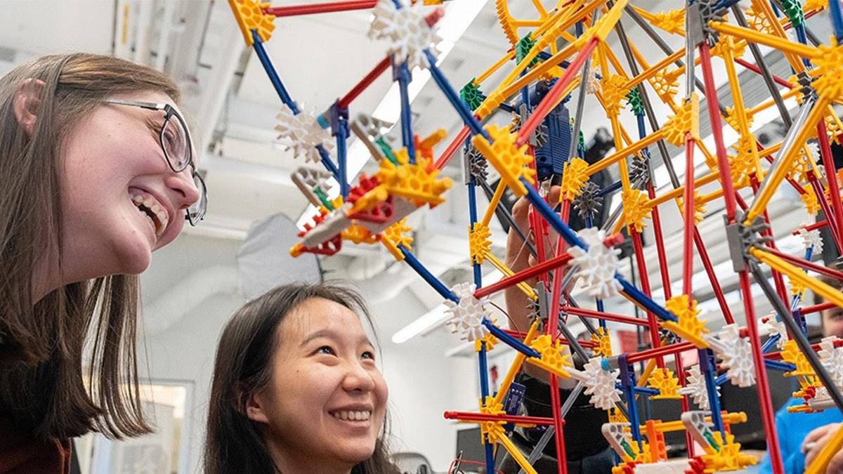 Students build a model ferris wheel for use in cybersecurity research