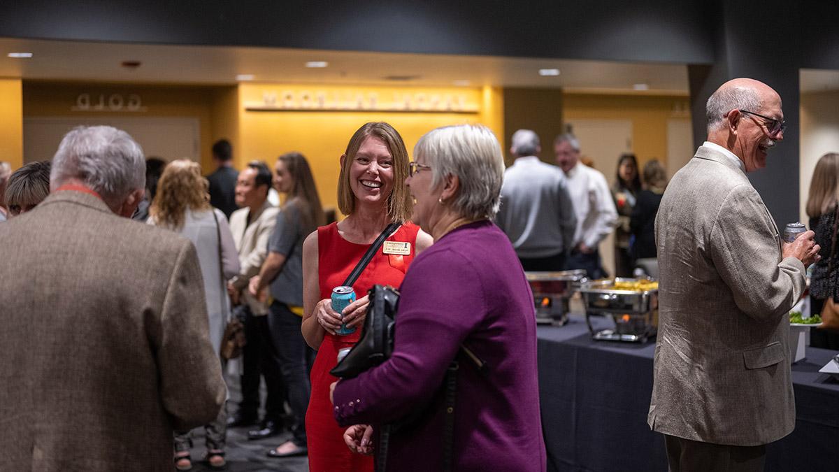 Faculty members talking