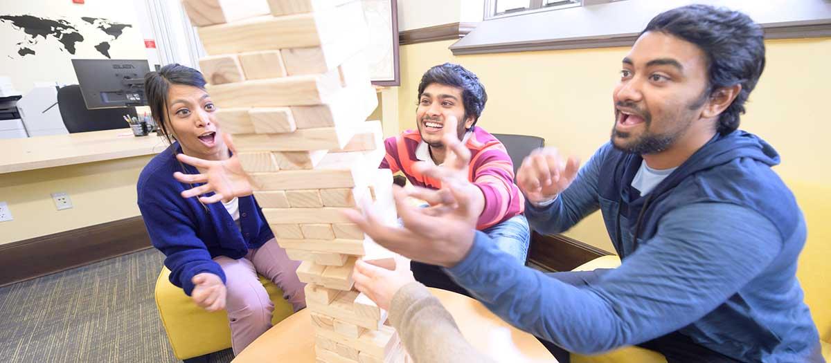 Students playing Jenga